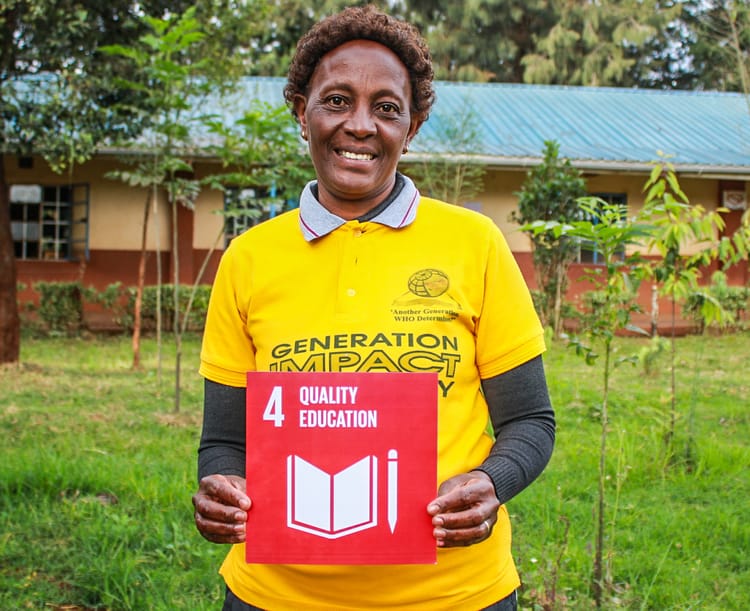 Teacher Ann holding an SDG 4 card during the TETEA Global Schools Campaign ESD session at Thirime Comprehensive School.